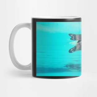 Cute penguin swimming in crystal blue water Mug